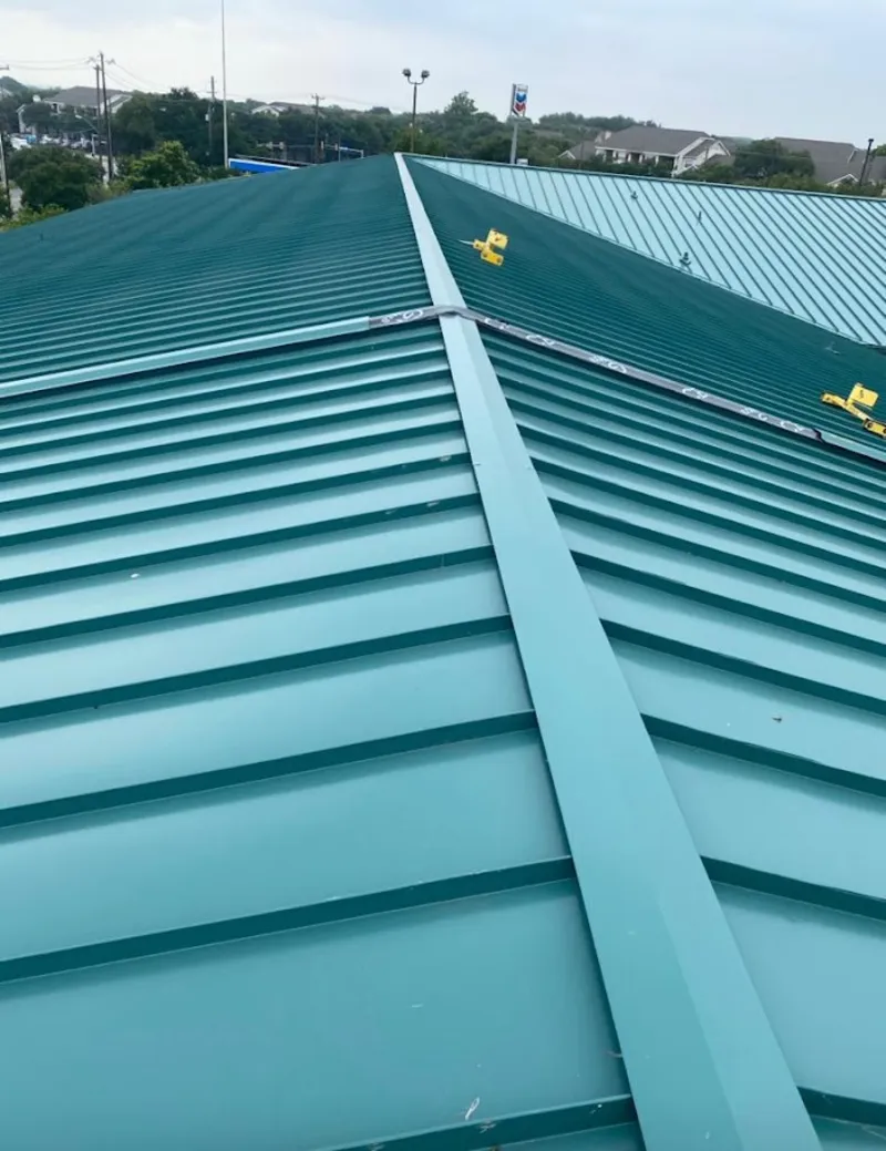 Green commercial metal roof ridge and valley for Metal Roof Repair in Borger