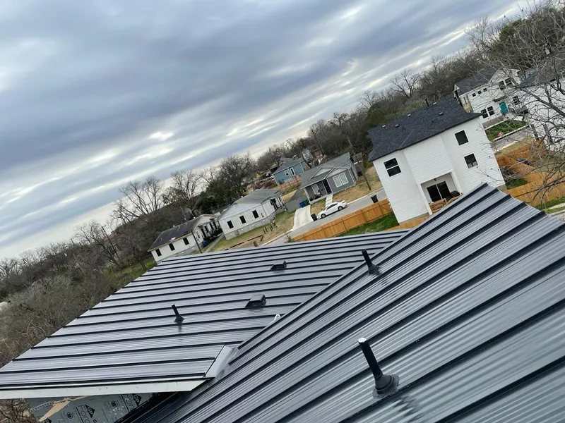 Standing seam metal roof panels with vents for Skylight Repair in Borger